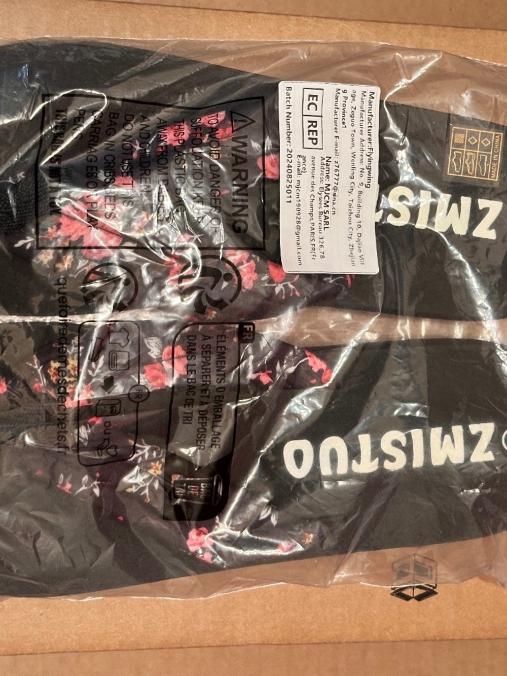 Zmistuo women's flip flops feature a black floral pattern